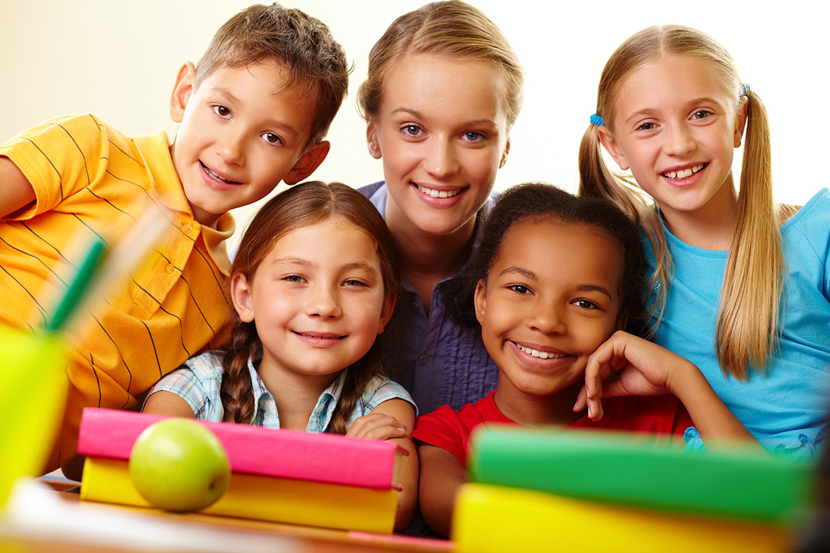 body-n-brain-happy-teacher-with-her-elementary-students